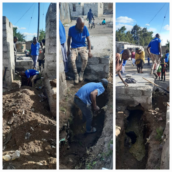 Informal Emptiers emptying a pit latrine in John Laing Compound Lusaka district Zambia